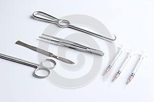 Instruments for plastic surgery on white background