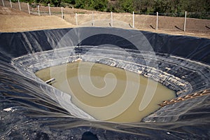 Insulated leachate pond part of landfill photo