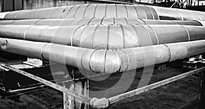 Insulated pipes for Oil & Gas industries. Black and white photo