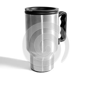 Insulated steel coffee mug on white