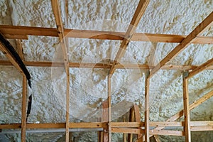 Insulation of attic with foam polyurea insulation cold barrier and insulation material