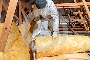 insulation of the house under the roof with the help of glass wool