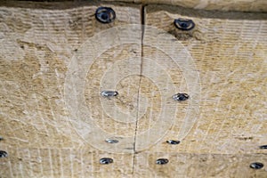 Insulation panels made of mineral wool, which were glued to the ceiling.