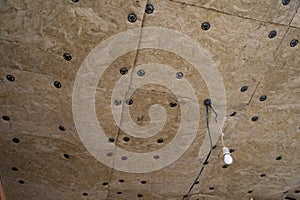 Insulation panels made of mineral wool, which were glued to the ceiling.