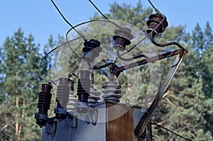 Insulators and cables which are part of transformers at electric power substation