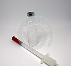 Insulin medicine bottle and syringe on white background. Type 1 diabetes. Close-up with space for inscription