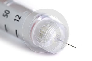 Insulin pen needle, threaded to attach securely and safely to insulin pen, solution for injection in pre-filled pen