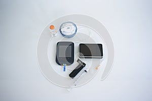 Insulin pump equipment and blood glucose tester photo