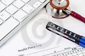 Insulin pump log record form and syringe wiht insulin