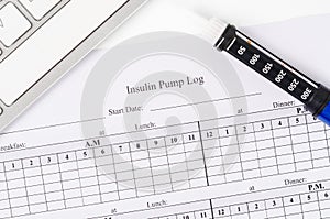 Insulin pump log record form and syringe wiht insulin