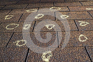 Insurance Adjuster Marked Roof With Hail Damage