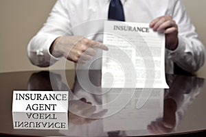 Insurance Agent Holding Insurance Contract