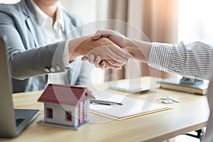 Insurance concept the chattel agent making a perfect deal of estate with his customer
