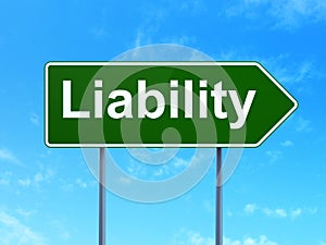 Insurance concept: Liability on road sign background