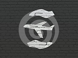 Insurance concept: Airplane And Palm on wall background