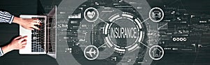 Insurance concept with person using a laptop
