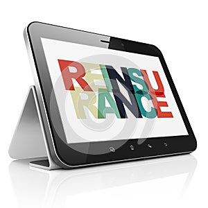 Insurance concept: Tablet Computer with Reinsurance on display