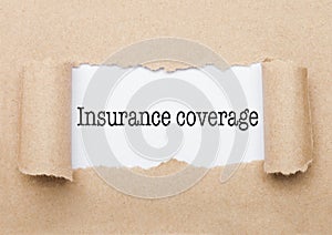 Insurance coverage text appearing behind paper