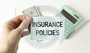 Insurance Policies text on paper with heart beat