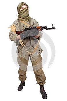 Insurgent wearing keffiyeh with AK 47 gun