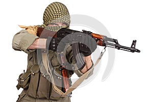 Insurgent wearing keffiyeh with AK 47 gun