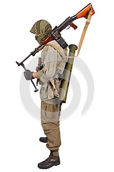 Insurgent wearing keffiyeh with machine gun