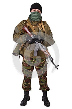 Insurgent wearing shemagh with kalashnikov rifle