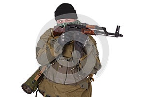 Insurgent wearing shemagh with kalashnikov rifle photo