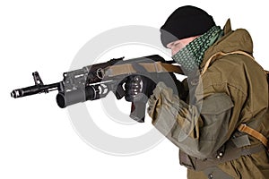 Insurgent wearing shemagh with kalashnikov rifle photo