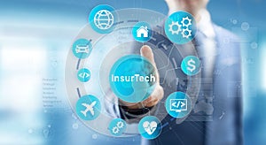 Insurtech button on virtual screen. Insurance technology internet digital iot insured family car property health.
