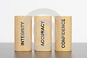 Integrity, accuray and confidence printed on three pillars