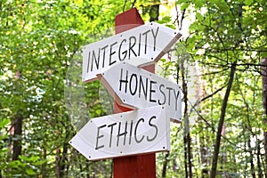 Integrity, honesty, ethics - signpost with three arrows