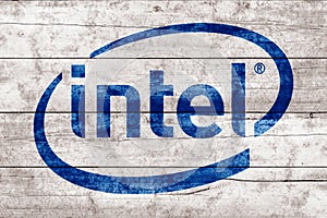 Intel sign. Close-up Intel logo on wooden surface