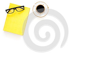 Intellectual entertainment concept. Books with empty cover near glasses, coffe, plant on white desk top view space for