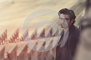 Intellectual man with eyeglasses outdoor. Retro colors