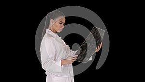 Intellectual woman healthcare personnel with white labcoat, looking at x-ray radiographic image, ct scan, mri, Alpha