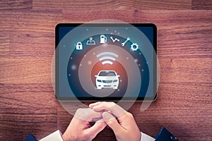 Intelligent car app on digital tablet concept photo