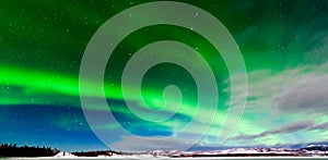 Intense display of Northern Lights Aurora borealis photo