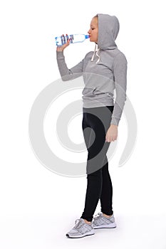 During intense exercise, the girl spends time drinking an energy drink