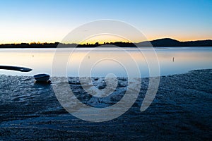 Intensity of Tauranga sunrise across harbor