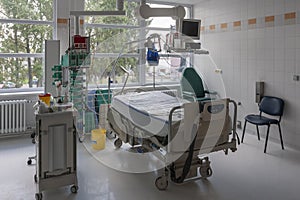 Intensive care unit in hospital, bed with monitor,  a place where they are treated patients with pneumonia caused by coronavirus