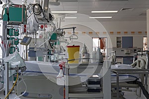 Intensive care unit in hospital, beds with monitors, ventilators, a place where can be  treated patients with pneumonia caused by