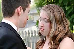Intent Prom Girl Fixing Boutonniere