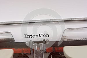 Intention word typed on a Vintage Typewriter