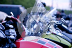 Intentionally Blurred Background. Motorcycles Parked in a Row.