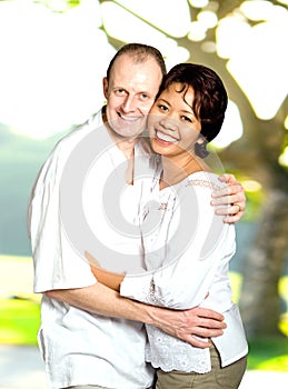 Inter-married couple of Asian and Caucasian photo