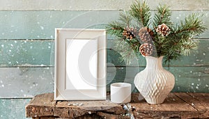 inter still life. Horizontal white frame mockup on vintage wooden bench, table. Modern white ceramic vase with pine tree branches