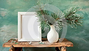 inter still life. Horizontal white frame mockup on vintage wooden bench, table. Modern white ceramic vase with pine tree branches