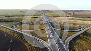 Interchange highway road network. Aerial landscape road crossing.