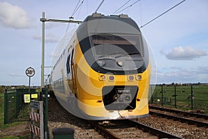 Intercity train at railroad track between Gouda and Rotterdam at Moordrecht